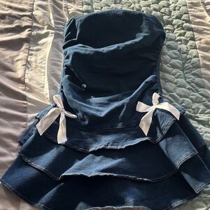 Stylish denim women’s Dress with White bows. Strapless.